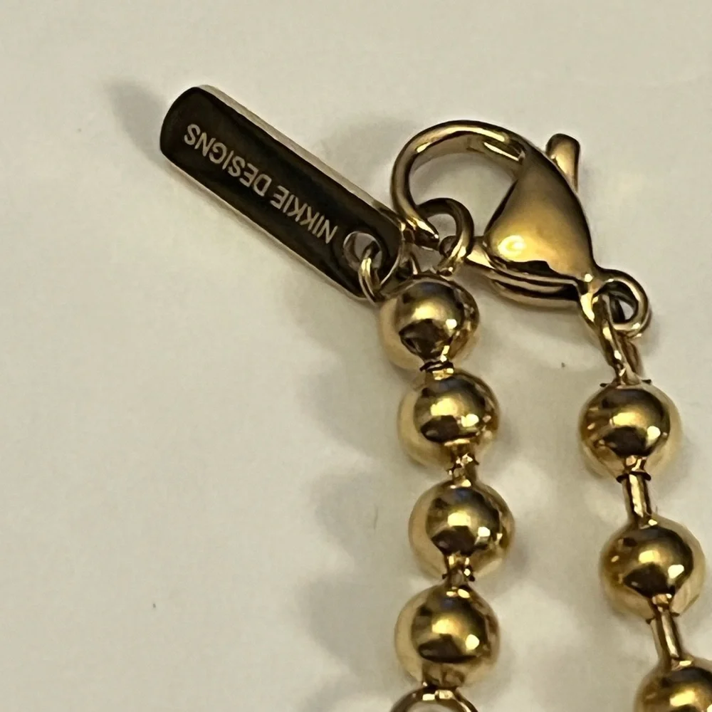nikkie designs elegant gold